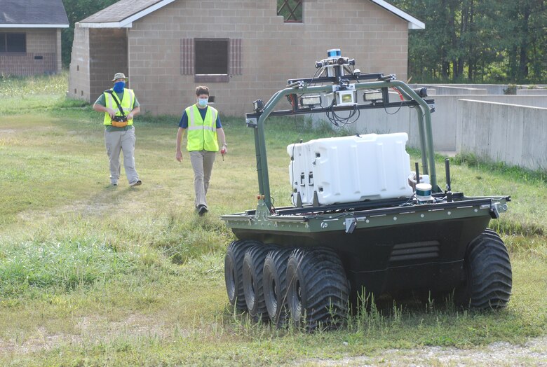 U.S. Army Engineer Research and Development Center researchers observe the Robotics for Engineering Operations autonomous vehicle while it traverses during the Maneuver Support, Sustainment and Protection Integration Experiments-2020, or MSSPIX-20, in Fort Leonard Wood, Mo., Sept. 16, 2020. The REO employs a set of robotic platforms to remotely characterize a site by fusing multiple sensing modalities on a fully autonomous unmanned ground vehicle to capture critical information for engineer missions.