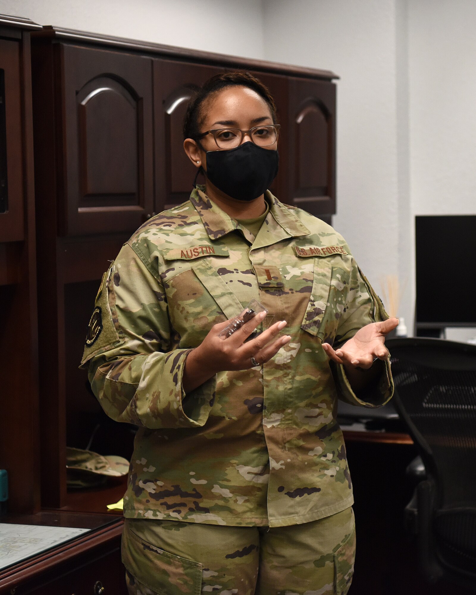 U.S. Air Force 2nd Lt. Tenisha Austin, 81st Contracting Squadron contracting officer simplified acquisitions section chief, gives remarks inside the Sablich Center at Keesler Air Force Base, Mississippi, Nov. 3, 2020. Austin was coined for her outstanding work during the end of year close-out. (U.S. Air Force photo by Senior Airman Suzie Plotnikov)