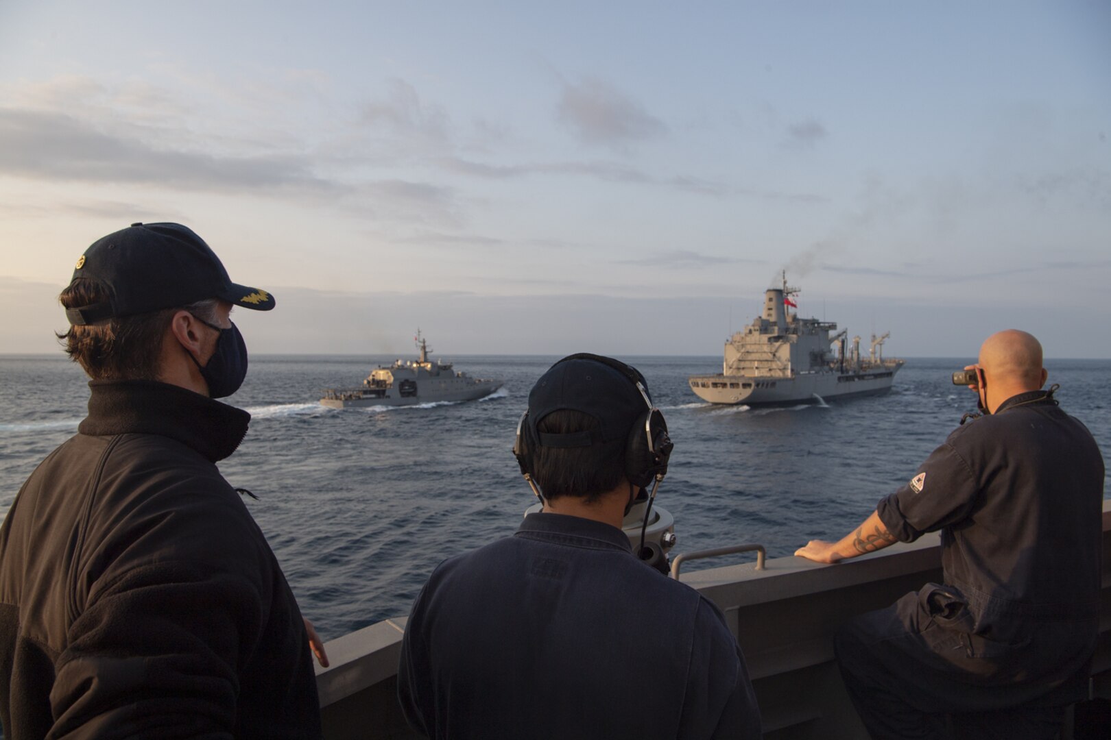 Cmdr. Rion Martin, commanding officer of Independence-class littoral combat ship USS Gabrielle Giffords (LCS 10), oversees a replenishment-at-sea (RAS) with Chilean Navy replenishment oiler CNS Almirante Montt (AO-52) Nov. 7, 2020.