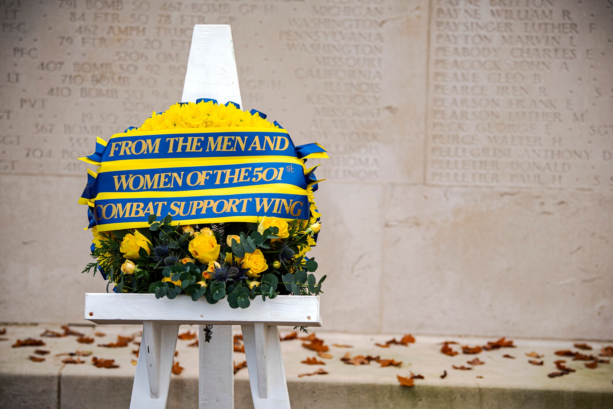 A wreath from the 501st Combat Support Wing rests in front of the Tablets of the Missing during a Veterans Day ceremony at the Cambridge American Cemetery and Memorial, England, Nov. 9, 2020. This wreath was placed to honor the men and women who have sacrificed their lives in service to the United States. (U.S Air Force photo by Senior Airman Eugene Oliver)