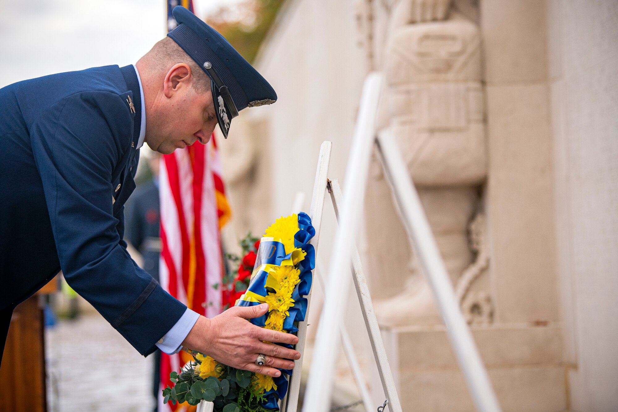 U.S. Air Force Col. Kurt Wendt, 501st Combat Support Wing commander, lays a wreath along the Tablets of the Missing during a Veterans Day ceremony at Cambridge American Cemetery and Memorial, England, Nov. 9, 2020. The ceremony honors the men and women who have sacrificed their lives in service to the United States. (U.S Air Force photo by Senior Airman Eugene Oliver)