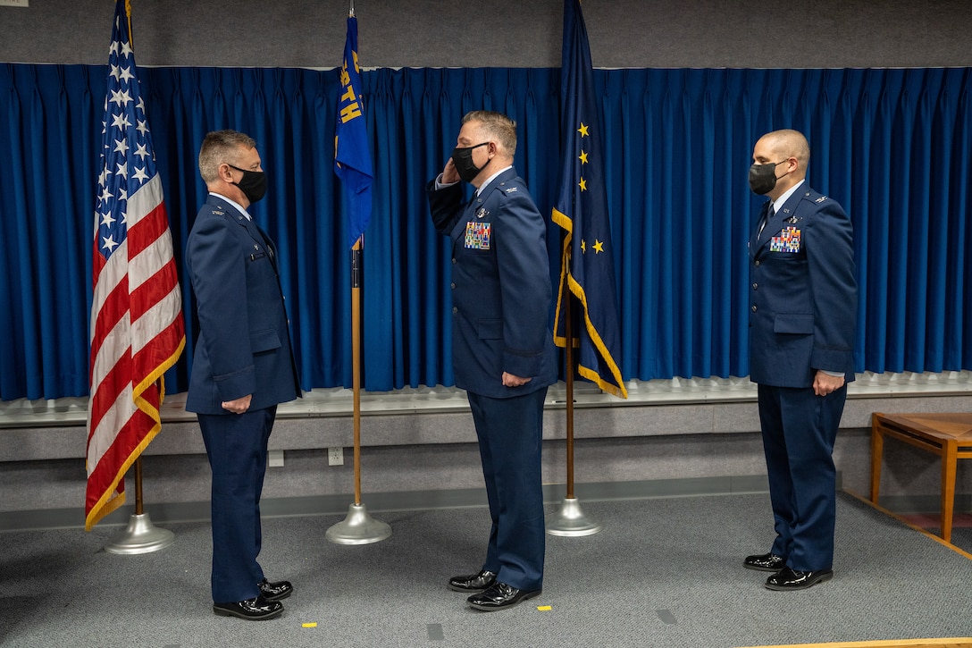 Alaska Air National Guard Col. Matthew Calabro succeeds Col. Kenneth Radford as 176th Mission Support Group commander .