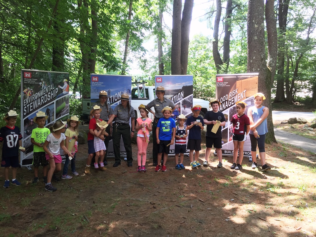 The newest Tully Lake Junior Rangers pose for a picture with their Summer Ranger mentors after the graduation ceremony.