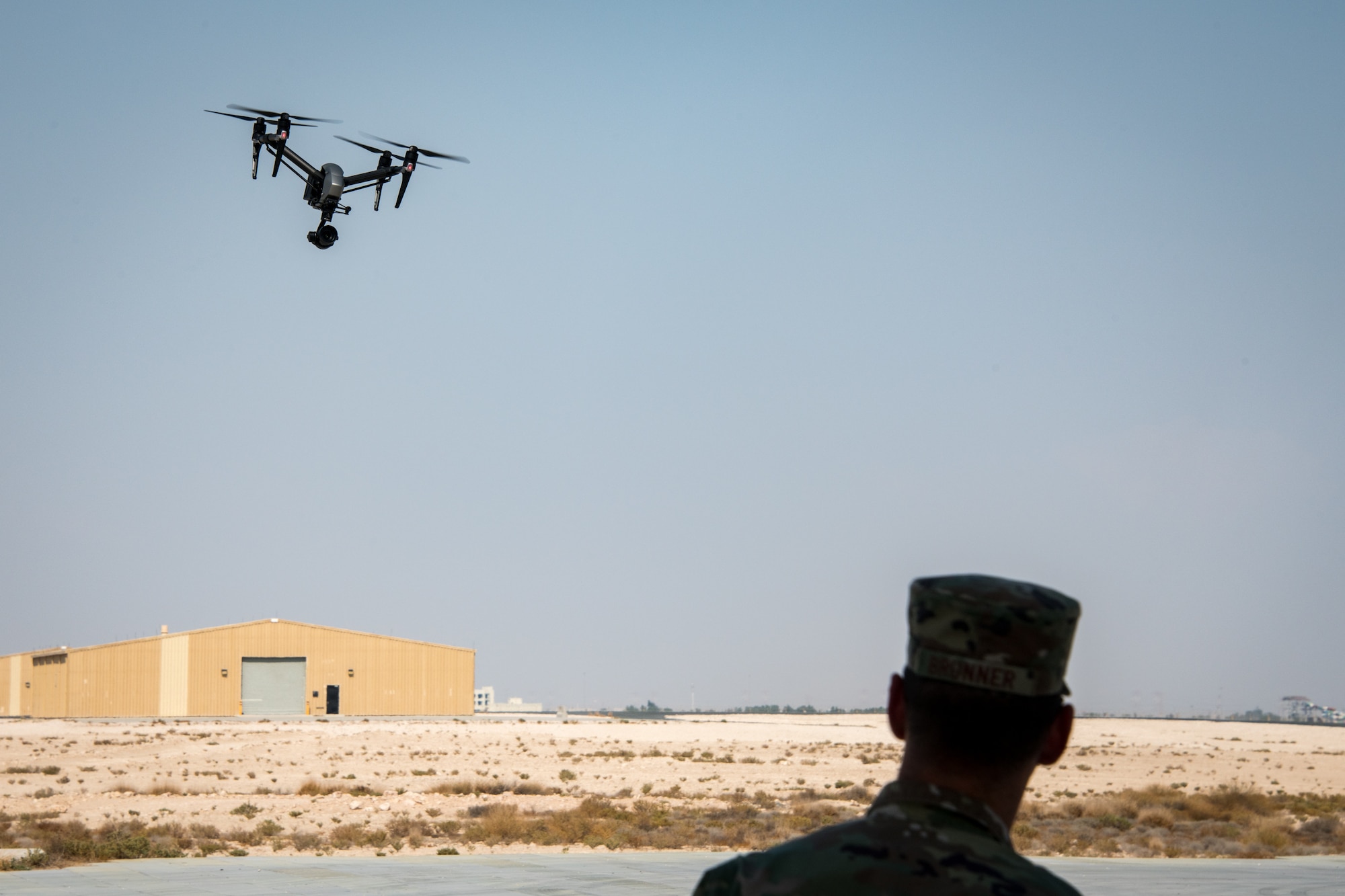 Airman flying drone