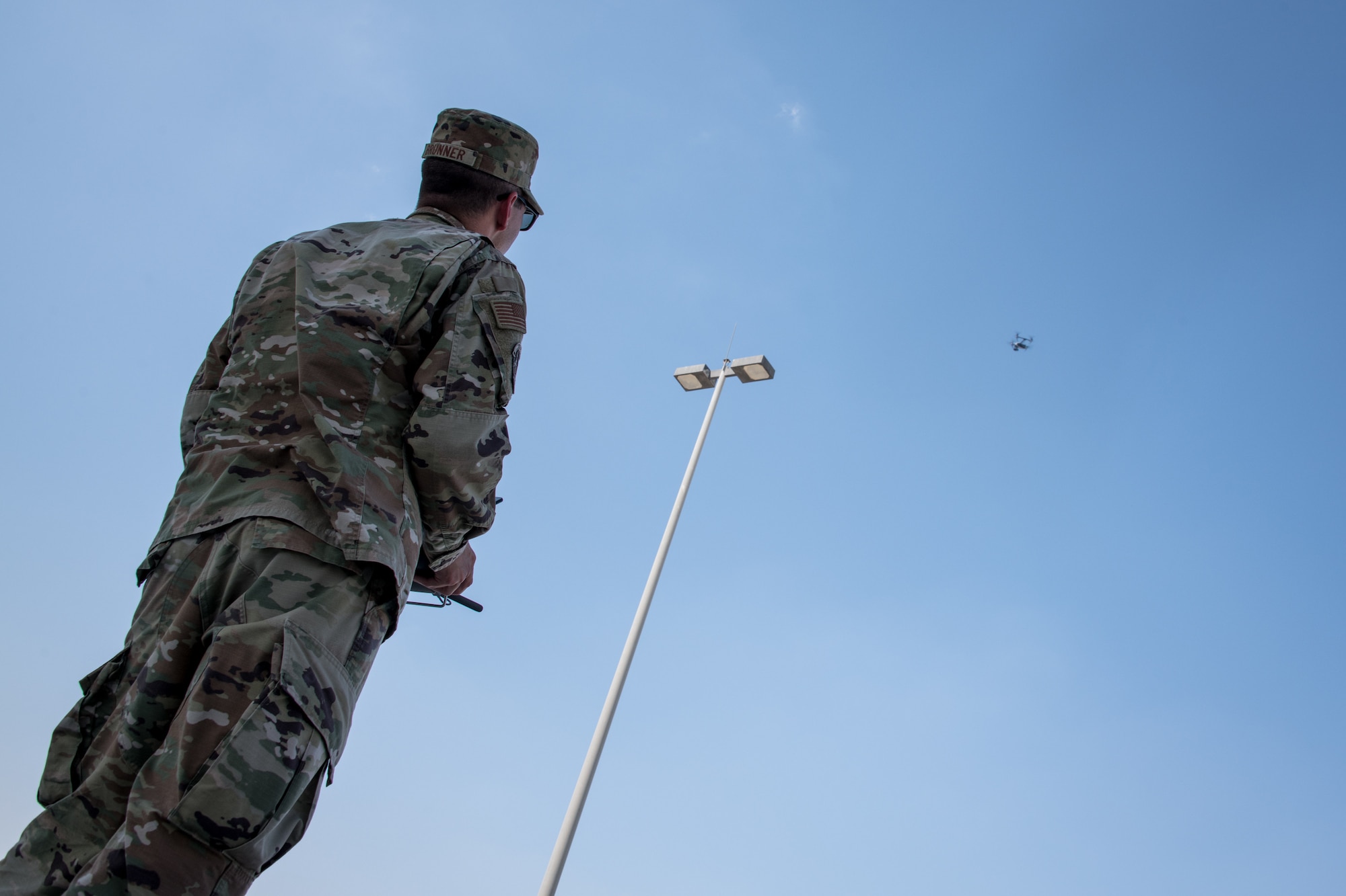 Airman flying drone