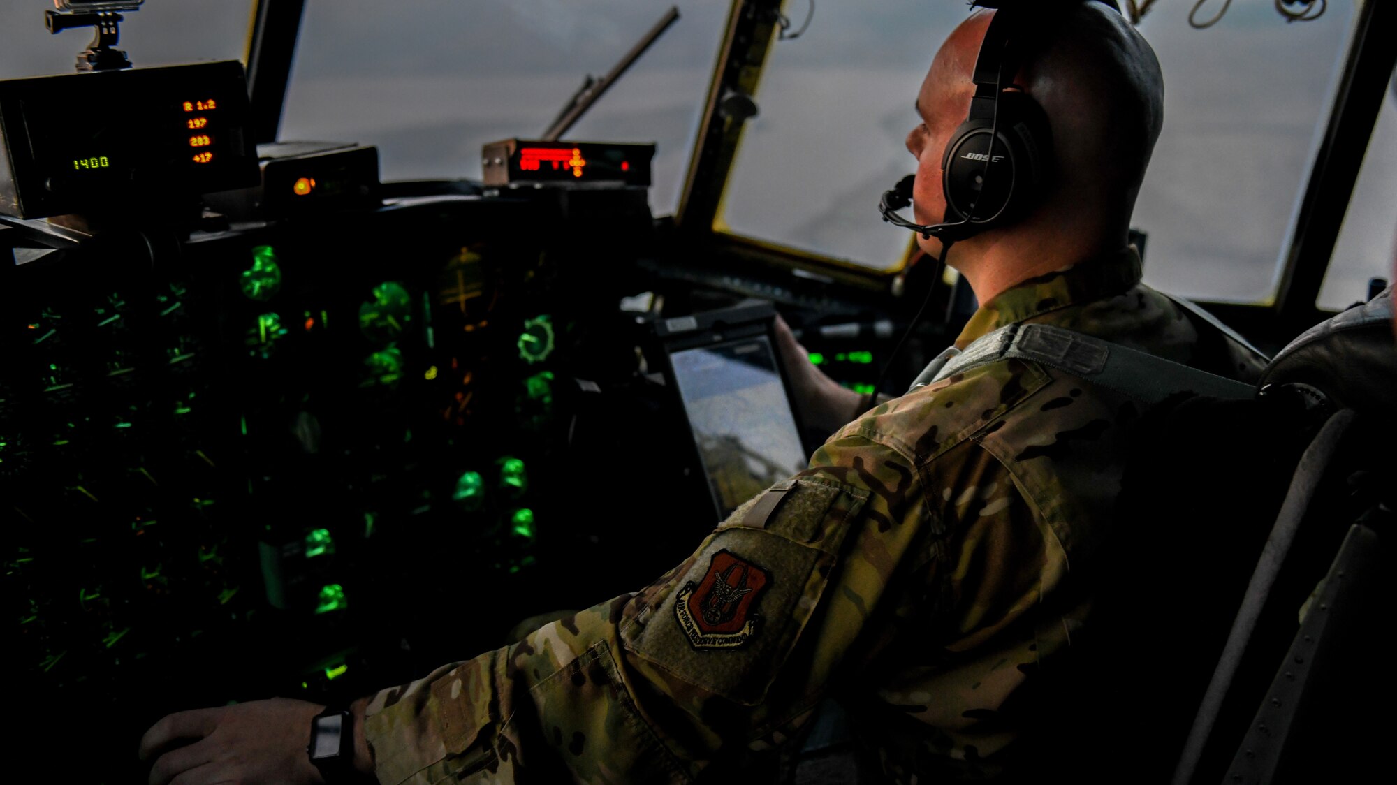 Capt. Michael Sammartino, a pilot assigned to the 757th Airlift Squadron, copilots an aerial spray modified C-130H Hercules aircraft, Sept. 23, 2020, above Mountain Home Air Force Base’s Saylor Creek Training Range, Idaho.