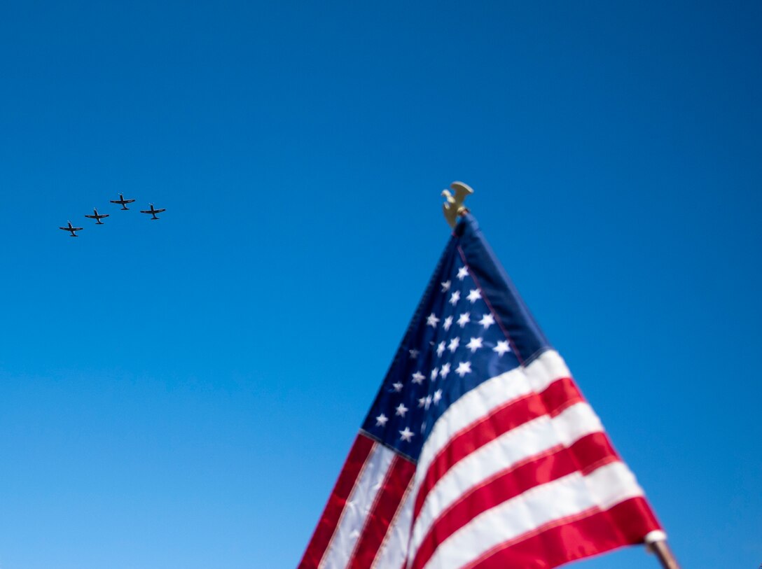 Four T-6A Texan II perform a flyover the city to honor Veterans on Nov. 11 2020, Del Rio, Texas. The flyover was to celebrate Veterans Day and show support to service members both past and present. (U.S. Air Force photo by Airman 1st Class David Phaff)