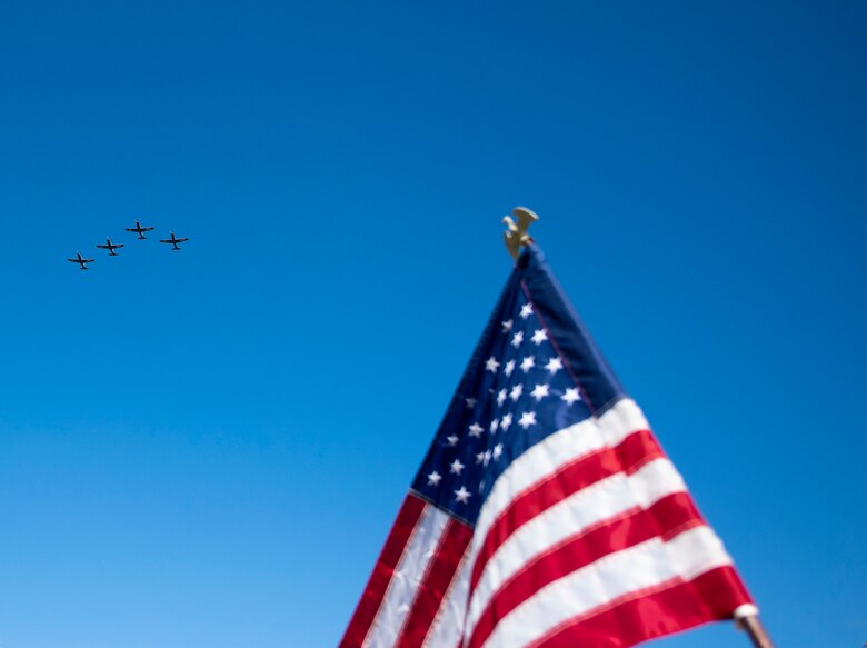 Four T-6A Texan II perform a flyover the city to honor Veterans on Nov. 11 2020, Del Rio, Texas. The flyover was to celebrate Veterans Day and show support to service members both past and present. (U.S. Air Force photo by Airman 1st Class David Phaff)