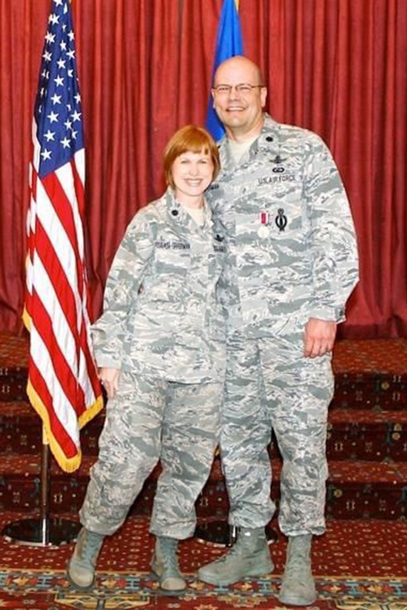 Don Opperman, a U.S. Air Force veteran, right, and his wife, now Col. Anita Feugate Opperman, 341st Missile Wing commander, pose for a photo. (Courtesy photo)