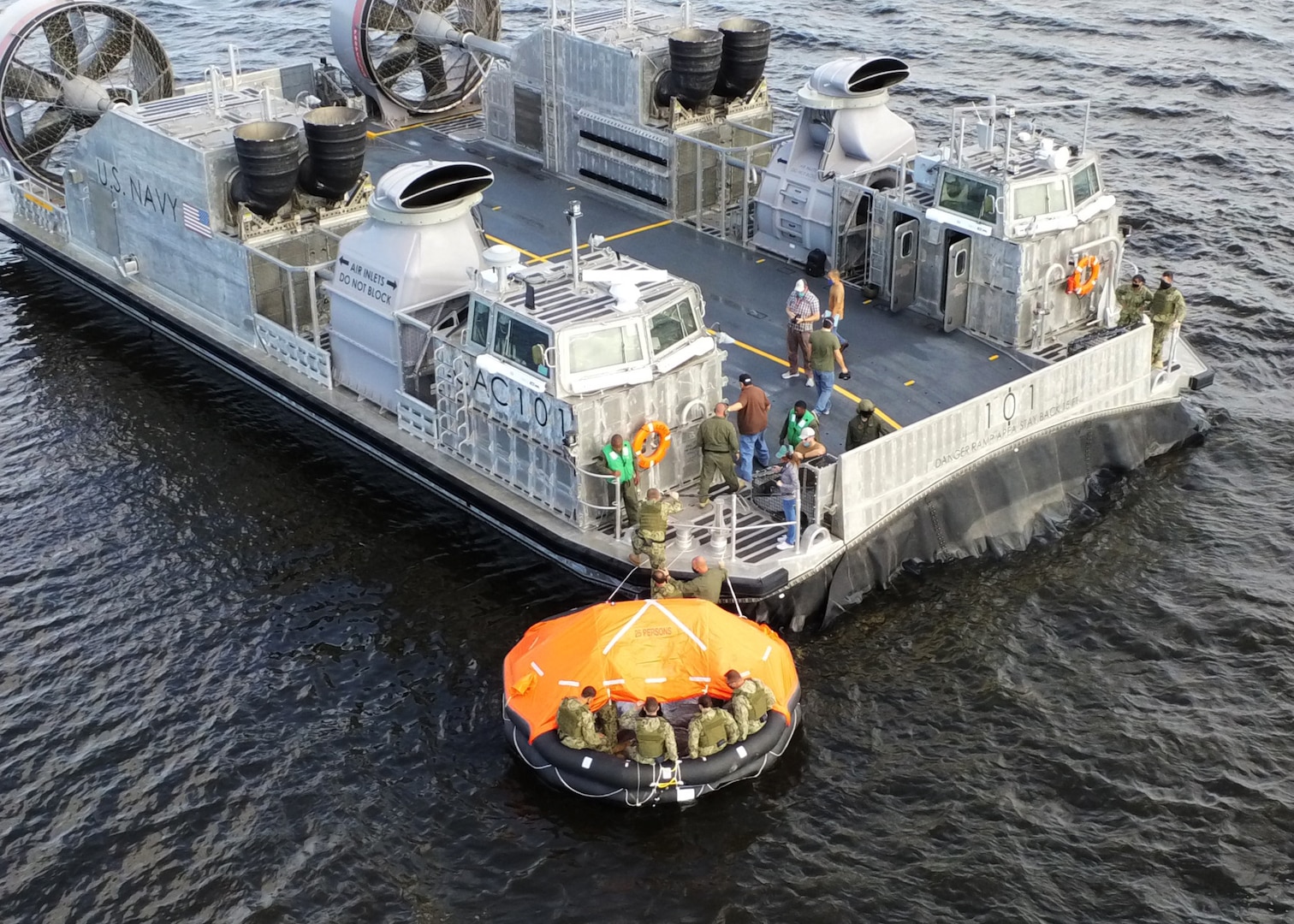 Reservists demonstrated the ability to safely deploy and board a 25-person life raft from the Landing Craft Air Cushion 100 Class in the event of an abandoned ship during a egress training Nov. 7-8.