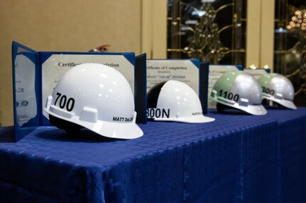 Congratulations to Cadre 9 for graduating from the Executive Development Program (EDP)! Featured in the picture are their new personalized hard hats with their new job titles and their certificates.