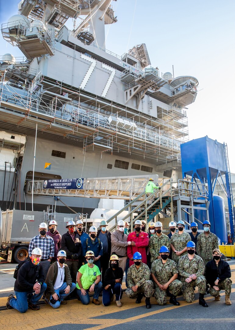 The tank team for the USS George H.W. Bush (CVN 77) project, comprised of shipyard personnel, Sailors, and contractors, completed work on more than 500 tanks and helped ensure the Bush undocked on time Aug. 29.
