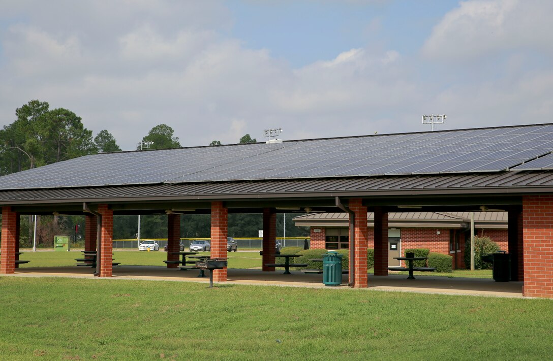 Marine Corps Logistics Base Albany hosts a 31-megawatt solar farm providing additional resilience and emissions benefits to the regional grid. A few buildings on base have solar panels on rooftops. Two Marine Corps bases, including MCLB Albany, recently received the 2021 Energy Excellence Award. (U.S. Marine Corps photo by Jennifer Parks)