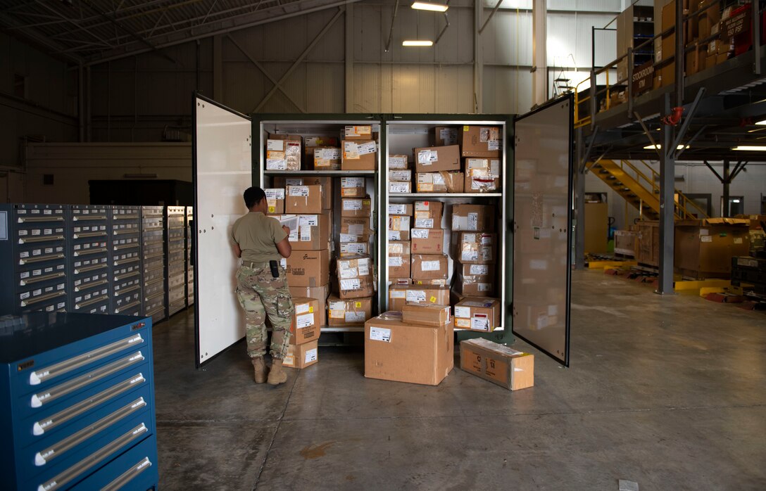 A photo of an Airman about to do inventory.