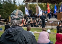 Members of the local community listen to guest speakers at the 8th annual Red, White and Blue Festival at the Hanahan Amphitheater, in Hanahan, S.C., November 7, 2020. Mayor Christie Rainwater, City of Hanahan mayor, and members of Joint Base Charleston and U.S. Marine Corps Recruiting Station Columbia also spoke about the importance of Veterans Day at the event. Additionally, the Joint Base Charleston Honor Guard presented the colors of each branch of service while the Charleston Southern University Concert Band played the official songs of the Army, Marine Corps, Navy, Air Force and Coast Guard.