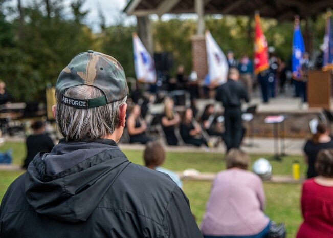 Members of the local community listen to guest speakers at the 8th annual Red, White and Blue Festival at the Hanahan Amphitheater, in Hanahan, S.C., November 7, 2020. Mayor Christie Rainwater, City of Hanahan mayor, and members of Joint Base Charleston and U.S. Marine Corps Recruiting Station Columbia also spoke about the importance of Veterans Day at the event. Additionally, the Joint Base Charleston Honor Guard presented the colors of each branch of service while the Charleston Southern University Concert Band played the official songs of the Army, Marine Corps, Navy, Air Force and Coast Guard.