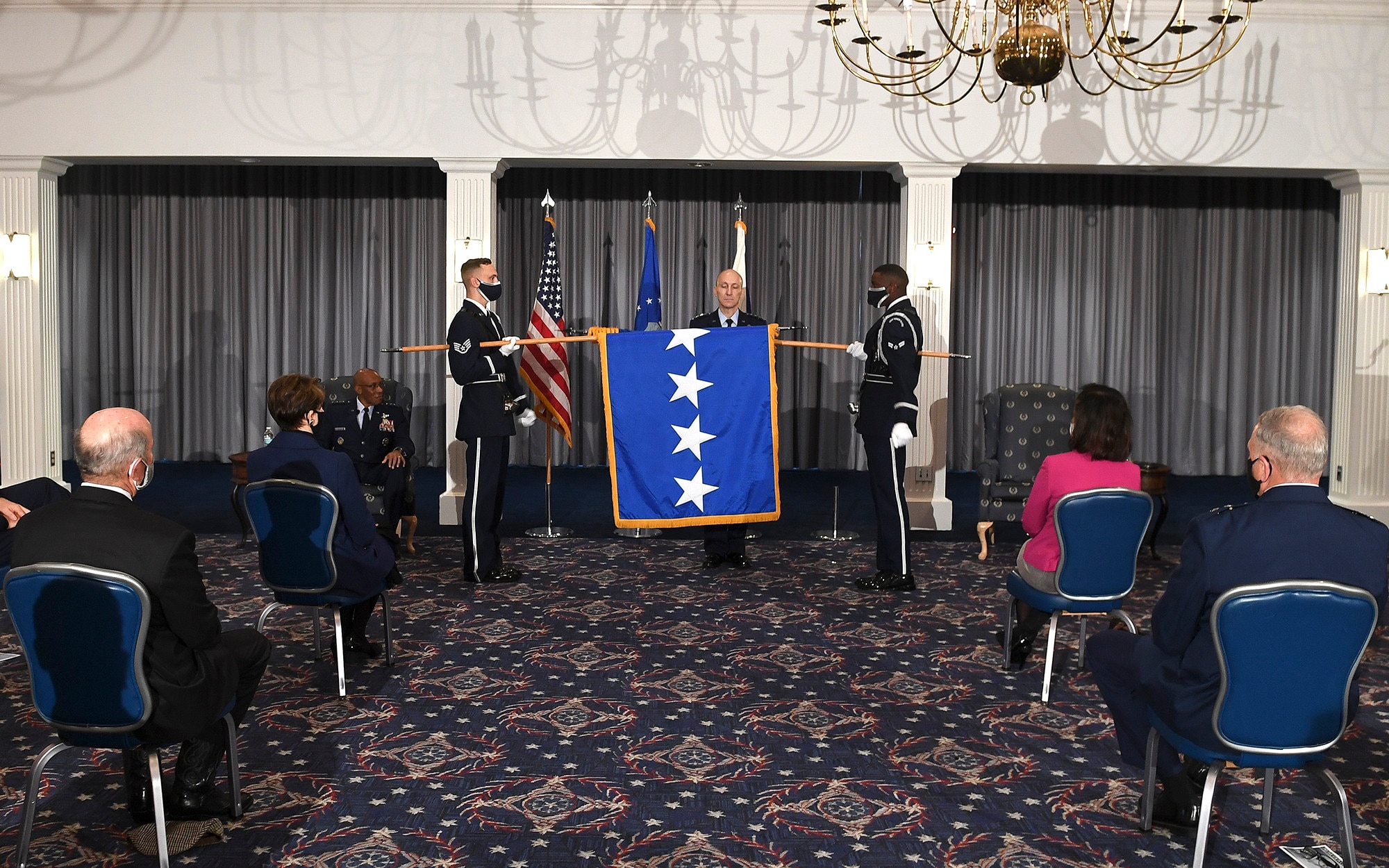 Members of the Air Force Honor Guard unfurl Gen. David Allvin's four-star flag during his promotion ceremony at Joint Base Anacostia-Bolling, Washington, D.C., Nov. 12, 2020. Allvin will serve as the 40th Vice Chief of Staff of the Air Force. (U.S. Air Force Photo by Andy Morataya)