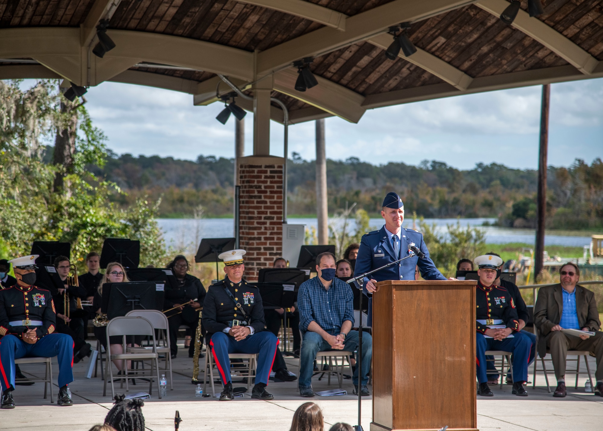 U.S. Air Force Maj. Christopher Piercy, 628th Contracting Squadron commander, speaks at the 8th annual Red, White and Blue Festival at the Hanahan Amphitheater, in Hanahan, S.C., November 7, 2020. Mayor Christie Rainwater, City of Hanahan mayor, and members of U.S. Marine Corps Recruiting Station Columbia also spoke about the importance of Veterans Day at the event. Additionally, the Joint Base Charleston Honor Guard presented the colors of each branch of service while the Charleston Southern University Concert Band played the official songs of the Army, Marine Corps, Navy, Air Force and Coast Guard.