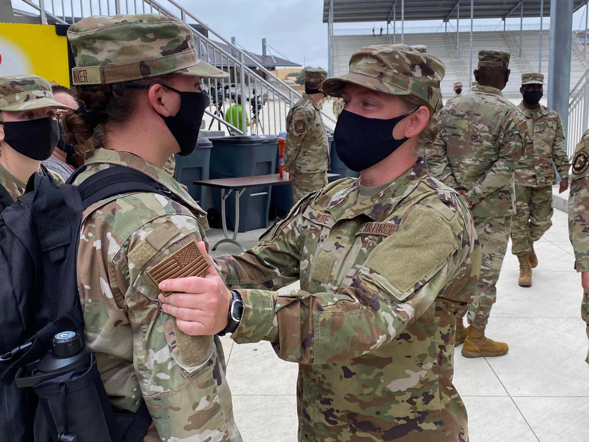 Airman Kimberly Moore graduates from BMT and gets to see her daughter Trainee Autumn Bonner who is 3 weeks behind her in BMT.