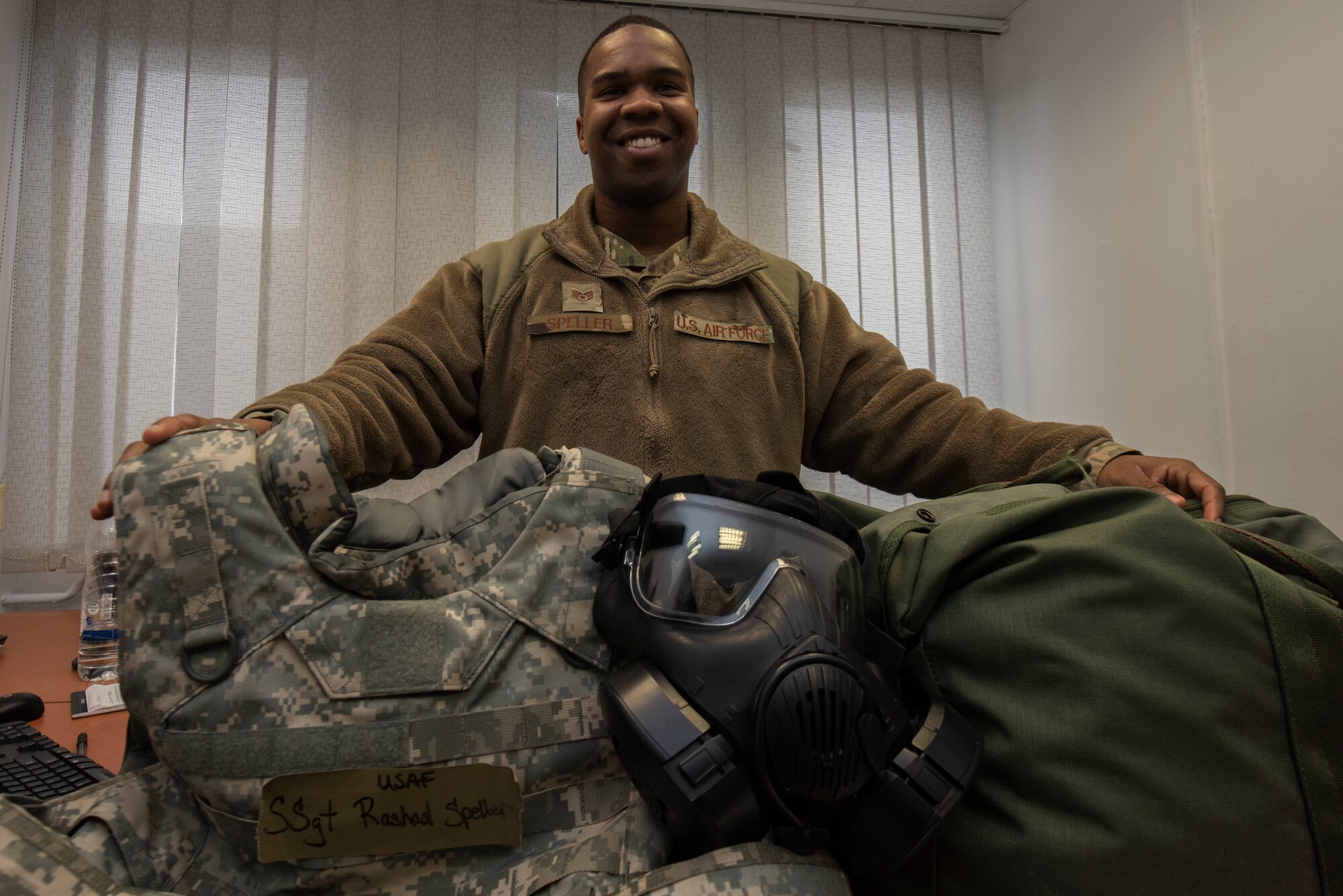 An Airman poses for a photo.