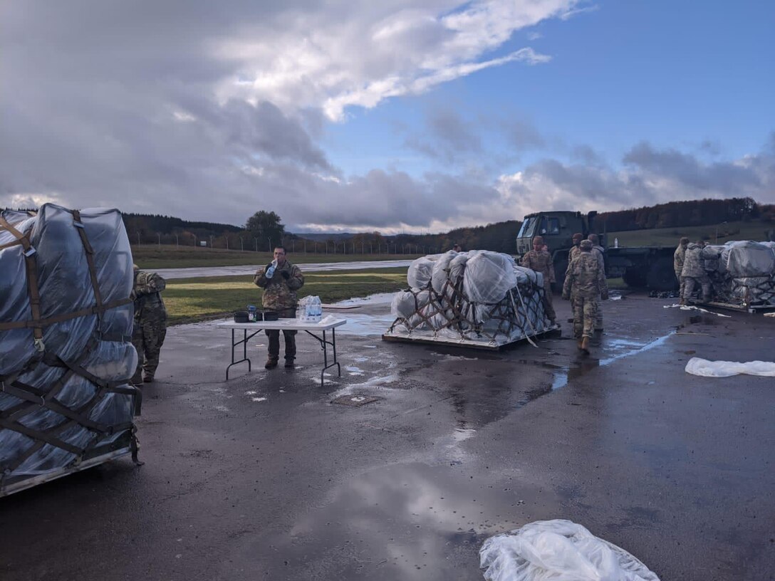 Photo of Airmen and cargo