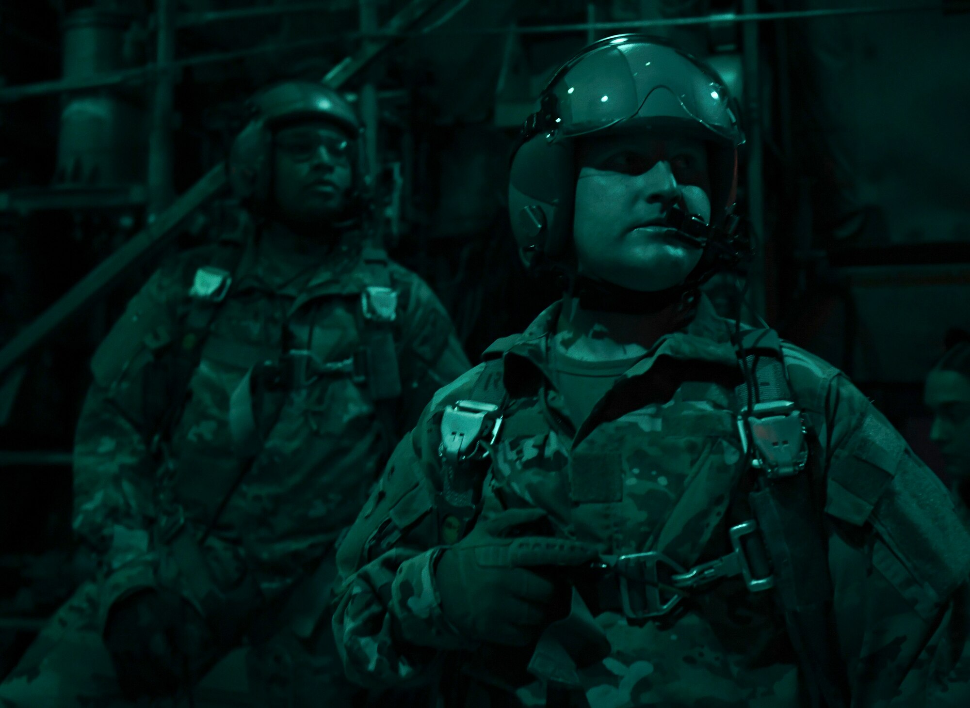 U.S. Air Force Airmen wait for a verbal response from the pilot on board a C-130 Hercules from Ali Al Salem Air Base, Kuwait Oct. 30, 2020.