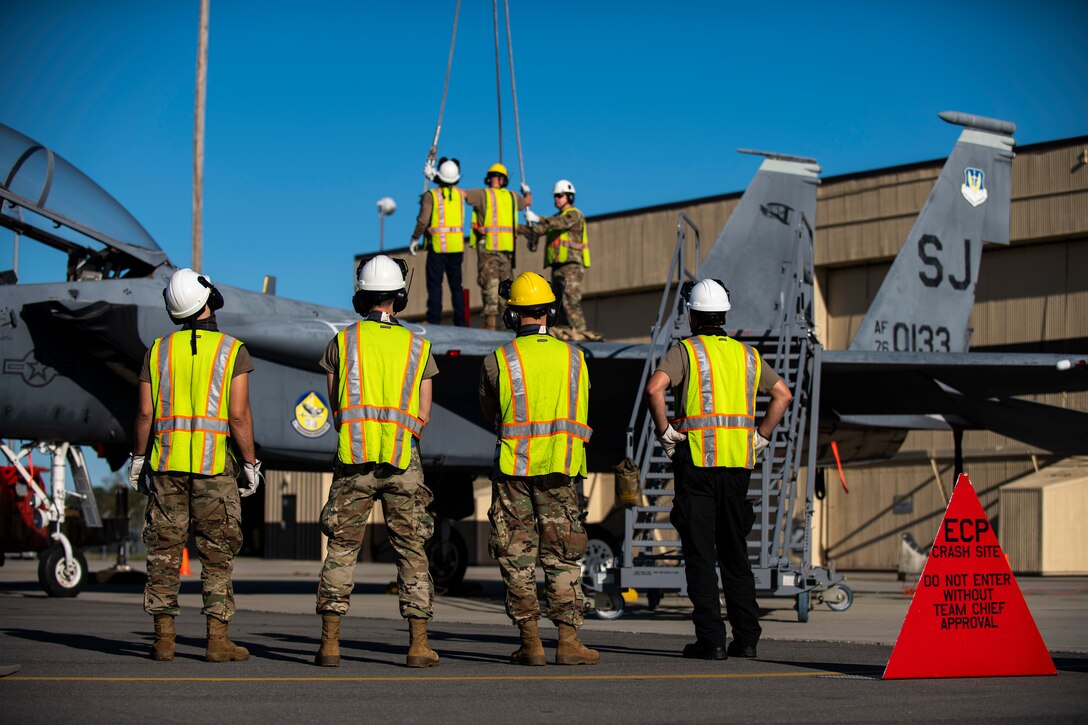 More than 50 military service members between the 4th Fighter Wing and 916th Air Refueling Wing Crash Damaged Disabled Aircraft Recovery teams (CDDAR) partook in an F-15E Strike Eagle crane-lift training, as well as KC-46A Pegasus familiarization at Seymour Johnson Air Force Base, North Carolina, Nov. 7, 2020.