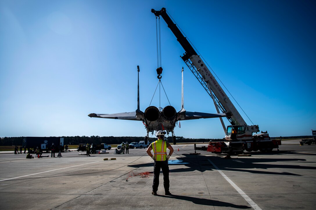 More than 50 military service members between the 4th Fighter Wing and 916th Air Refueling Wing Crash Damaged Disabled Aircraft Recovery teams (CDDAR) partook in an F-15E Strike Eagle crane-lift training, as well as KC-46A Pegasus familiarization at Seymour Johnson Air Force Base, North Carolina, Nov. 7, 2020.