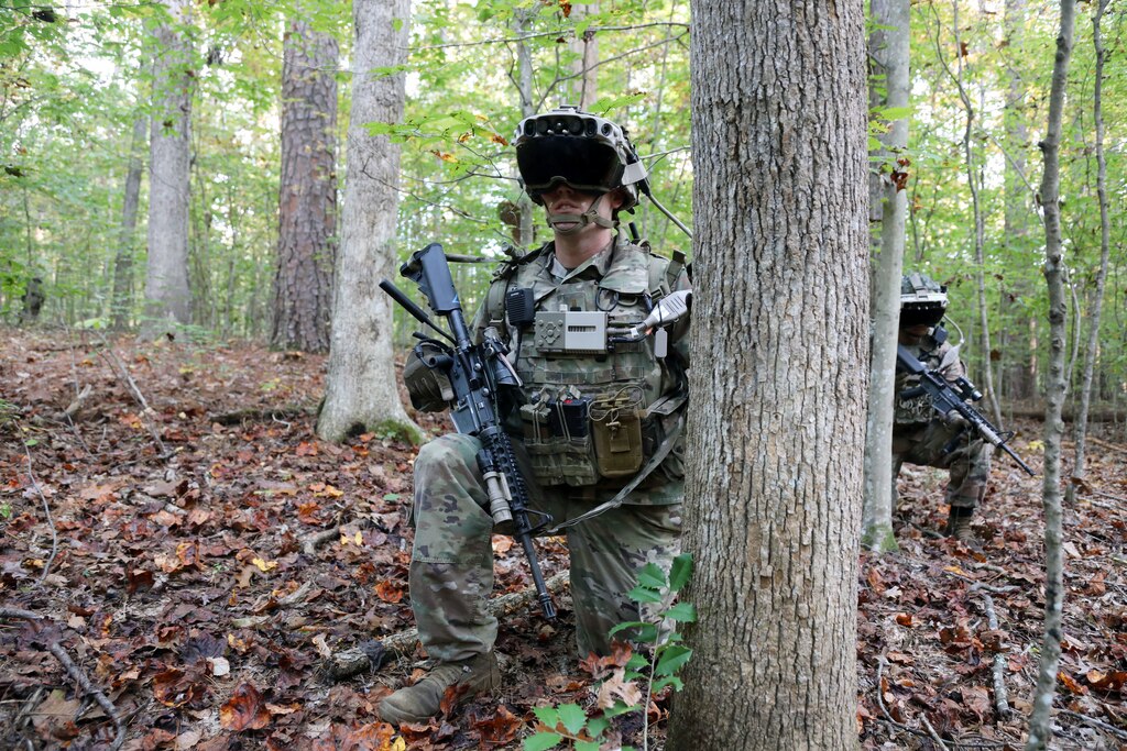 Soldier dons the Capability Set 3 (CS 3) militarized form factor prototype of the Integrated Visual Augmentation System (IVAS) during a Soldier Touchpoint 3 (STP 3) squad reconnaissance mission test event at Fort Pickett, Va in October 2020.
