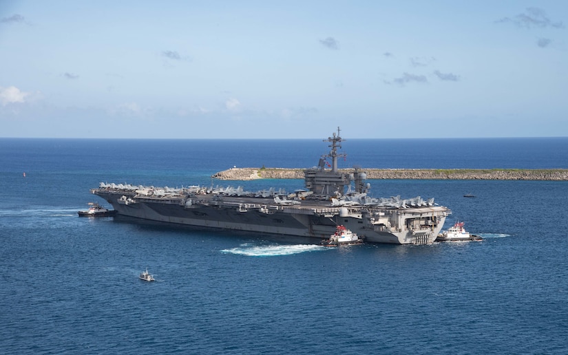 A large ship sails in the ocean.