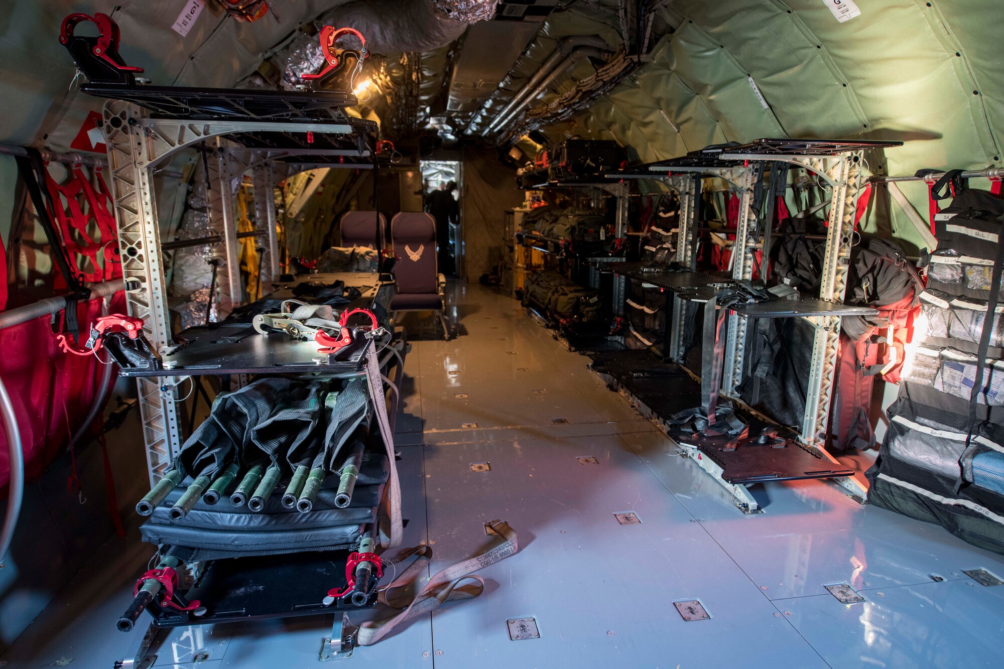 An aeromedical evacuation configuration is completed on a KC-135 Stratotanker in preparation for an AE mission at Travis Air Force Base, California, Nov. 7, 2020. Even though the primary mission of the KC-135 is extending Global Reach through air refueling, Stratotankers are capable of supporting a variety of missions including cargo delivery, AE, passenger delivery, serving as a communication platform and more. (U.S. Air Force photo by Senior Airman Lawrence Sena)