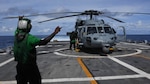 An MH-60S Seahawk assigned to the “Sea Knights” of Helicopter Sea Combat Squadron (HSC) 22 lands on the flight deck of the Freedom-class littoral combat during a medical evacuation (MEDEVAC), Nov. 11, 2020. Sioux City is deployed to the U.S. 4th Fleet area of operations to support Joint Interagency Task Force South's mission, which includes counter illicit drug trafficking in the Caribbean and Eastern Pacific. (U.S. Navy photo by Mass Communication Specialist Seaman Juel Foster/Released)