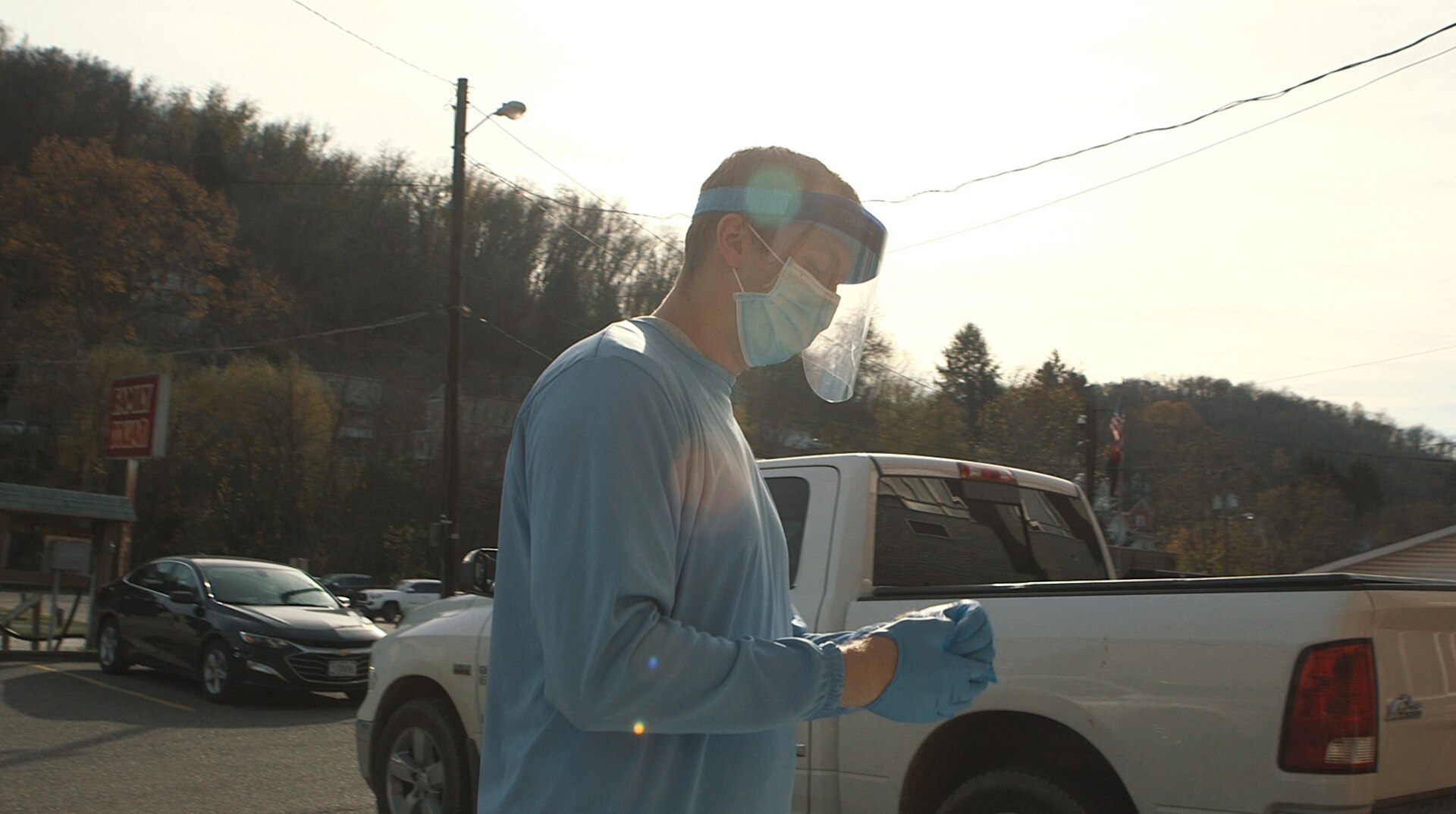 A member of the West Virginia National Guard's COVID-19 response prepares for a COVID-19 testing lane Nov. 7, 2020. Since Oct. 30, West Virginia National Guard personnel, with the assistance of local health department workers, have been working around the clock the establish locations, advertise testing and conduct nearly 400 testing lanes throughout West Virginia.