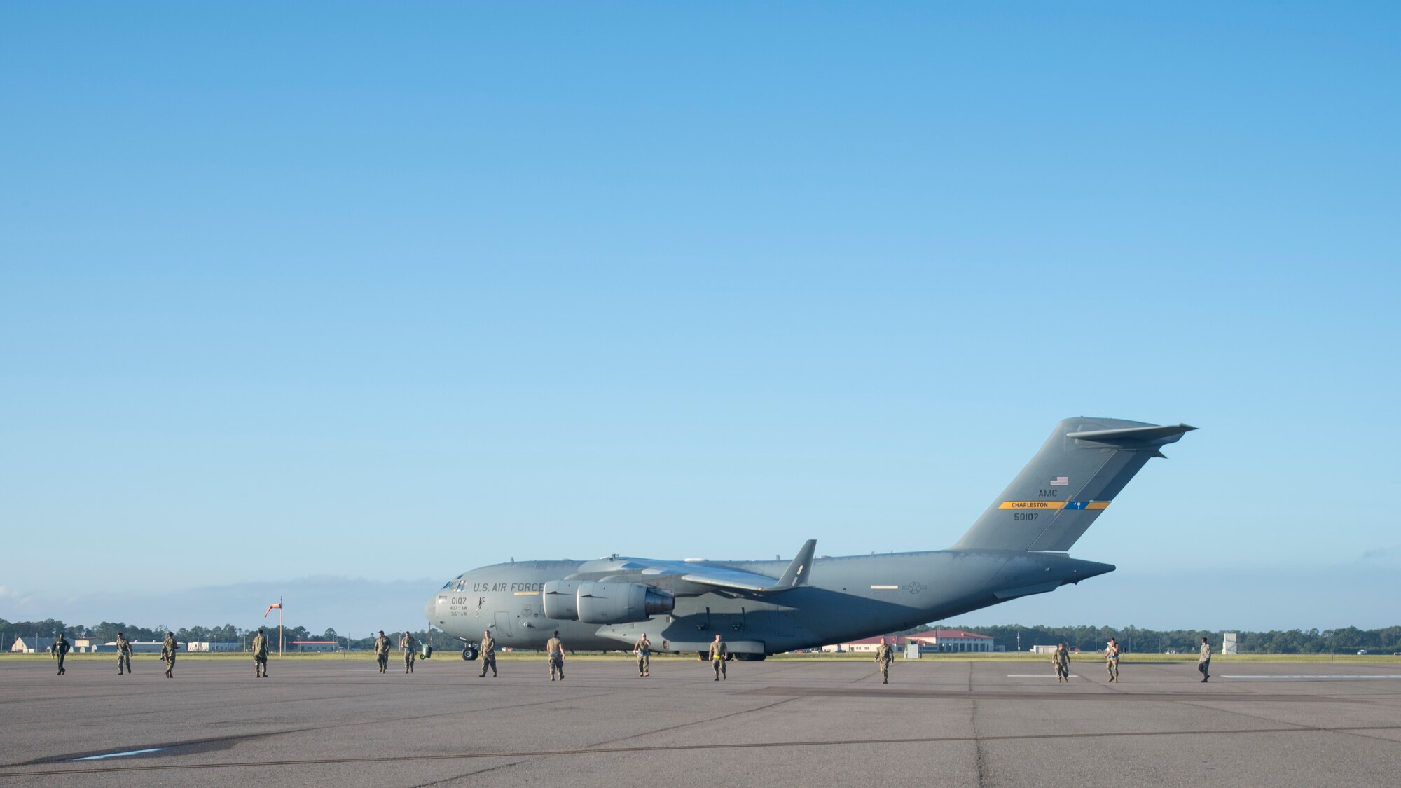 Team MacDill Airmen conduct a foreign object and debris (FOD) walk on the flight line at MacDill Air Force Base, Fla., Nov. 13, 2020, following Tropical Storm Eta.