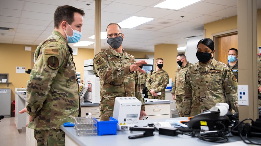 Maj. Gen. Mark E. Weatherington, 8th Air Force and Joint-Global Strike Operations Center commander, and Chief Master Sgt. Melvina A. Smith, 8th AF and J-GSOC command chief, visit the 2nd Medical Group laboratory during their official visit to the 2nd Bomb Wing at Barksdale Air Force Base, La., Nov. 12, 2020.  Weatherington and Smith were both briefed on the current COVID-19 protocols taking place at Barksdale. (U.S. Air Force photo by Airman 1st Class Jacob B. Wrightsman)