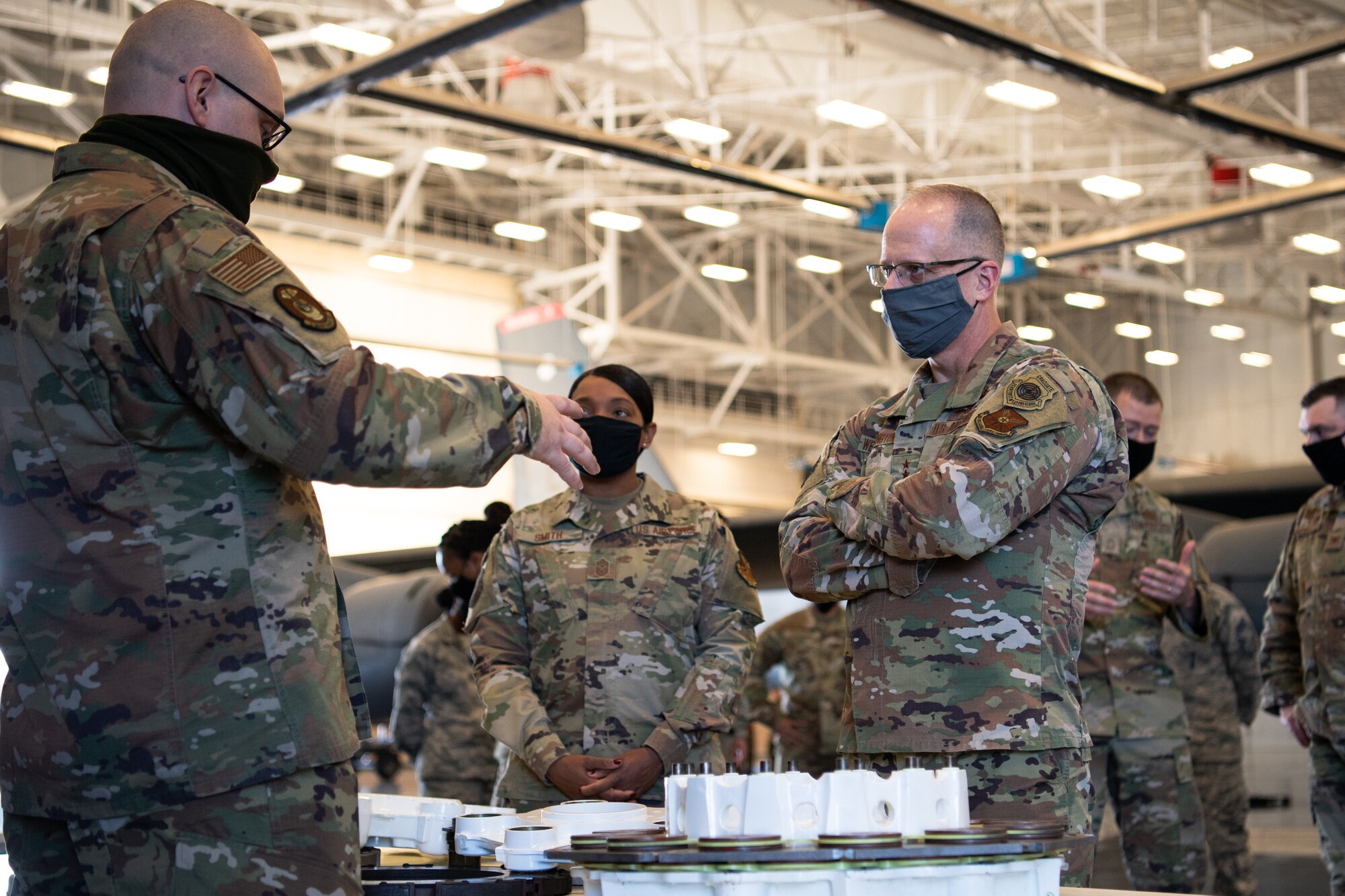 Maj. Gen. Mark E. Weatherington, 8th Air Force and Joint-Global Strike Operations Command commander, and Chief Master Sgt. Melvina A. Smith, 8th AF and J-GSOC command chief, are shown various aircraft brake systems at the TSgt. Joshua L. Kidd Weapons Load Training Facility during their official visit to the 2nd Bomb Wing at Barksdale Air Force Base, La., Nov. 12, 2020. Throughout the visit, Weathington and Smith interacted and recognized several Airmen for their outstanding work in their career fields. (U.S. Air Force photo by Airman 1st Class Jacob B. Wrightsman)