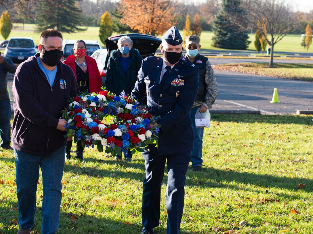 Jeff Gore, City of Huber Heights, Ohio mayor, and U.S. Air Force Col. Ivan Herwick, 88th Communications Group commander, lay a wreath during the city's Veterans Day Ceremony, Nov. 11, 2020. Members of Wright-Patt also provided they keynote address and performed the raising of the colors.