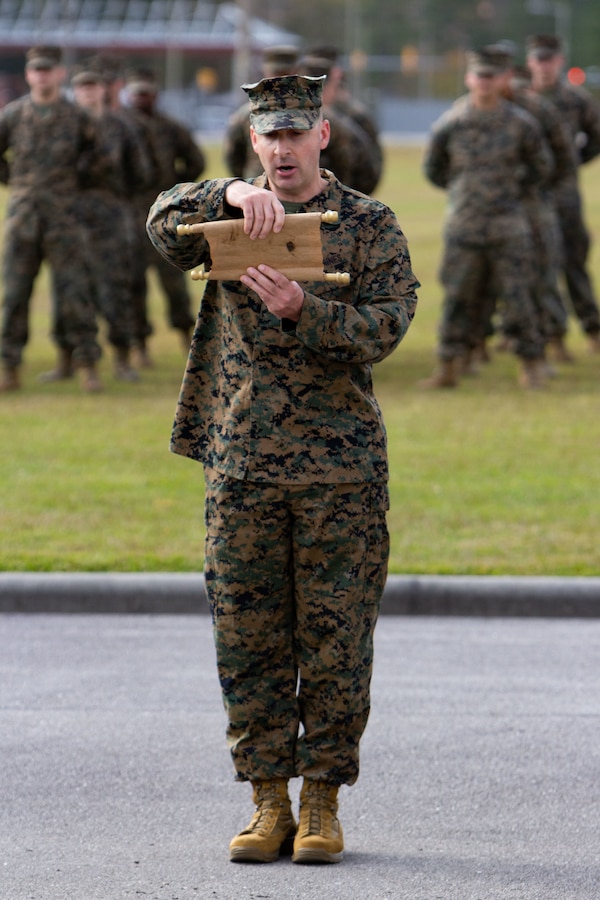 Lt. Col. Michael S. Beames, assistant chief of staff, administration, with Marine Forces, Special Operations Command, reads the birthday message from Gen. John A. Lejeune, 13th commandant of the Marine Corps, during the 245th Marine Corps Birthday cake cutting ceremony at Camp Lejeune, North Carolina, Nov. 6, 2020. COVID-19 restrictions have changed the way Marines across the globe are celebrating the Corps’ 245th birthday. The annual galas, held to commemorate the founding of Marine Corps, have been scaled back to ensure the health of the force while ensuring the most meaningful aspects of the festivities remain untouched.  (U.S. Marine Corps photo by Cpl. Jesula Jeanlouis)