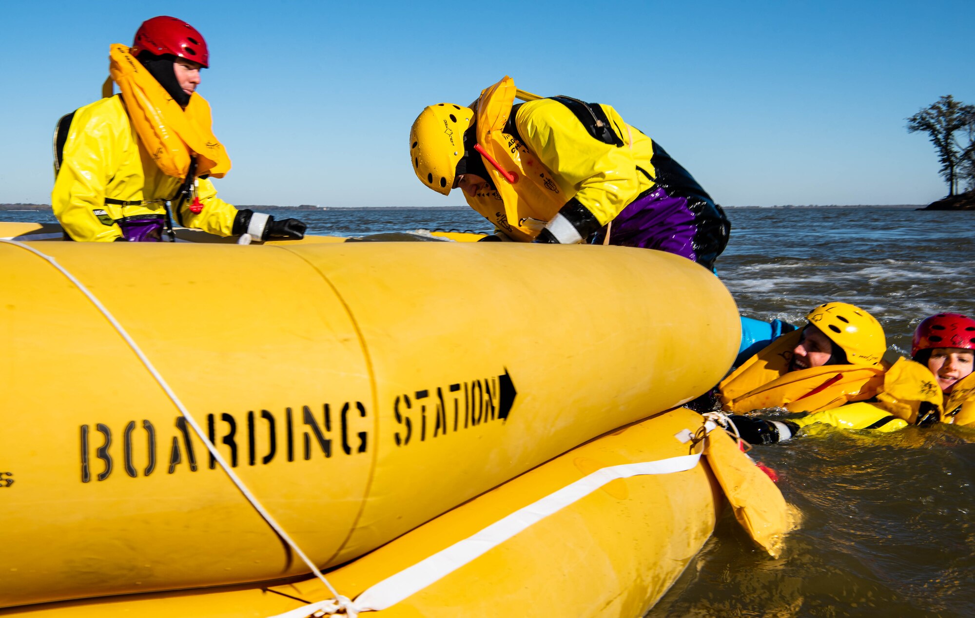 Airmen getting into a boat