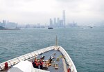 U.S. Coast Guard Cutter Bertholf crewmembers watch from cutter’s forecastle as Bertholf navigates toward Hong Kong