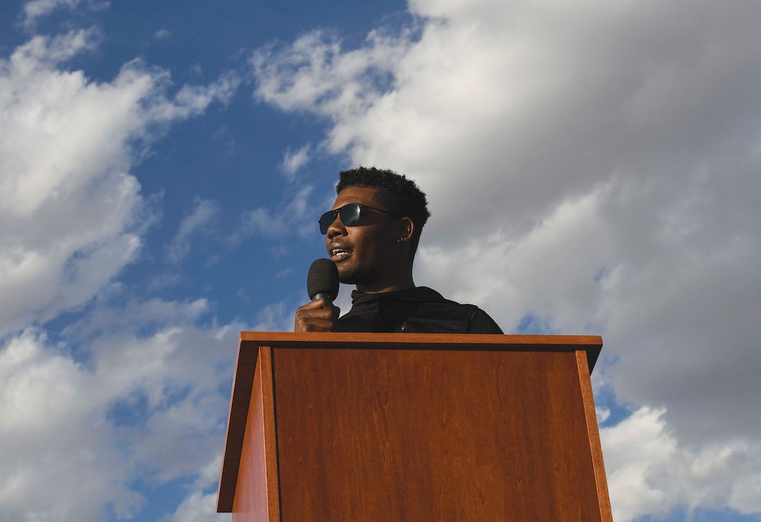 Senior Airman Marcel Williams, 27th Special Operations Wing public affairs broadcaster, speaks at “Gathering for Unity” event