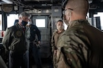 Members of USS Normandy visit, board, search, and seizure team brief Navy Secretary Kenneth Braithwaite