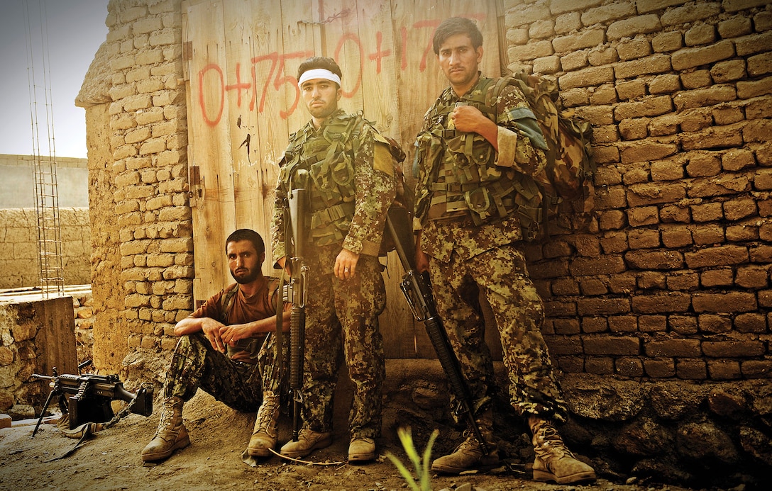 Afghan National Army soldiers, combined with assets from 45th Infantry Brigade, conduct cordon and search