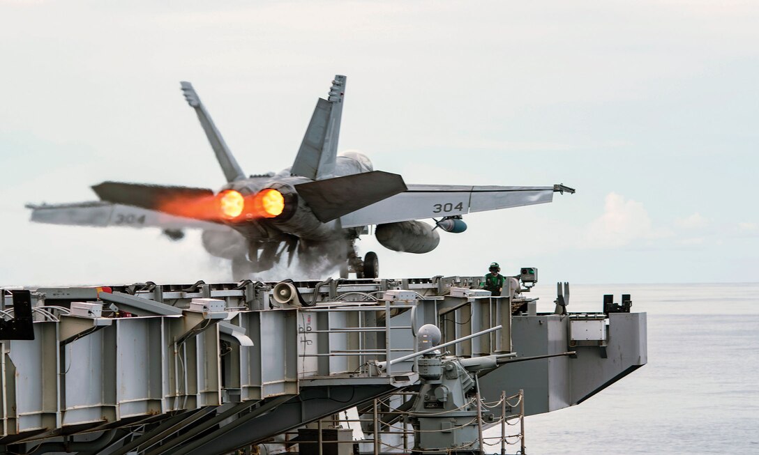 F/A-18E Super Hornet launches from flight deck of aircraft carrier USS Ronald Reagan