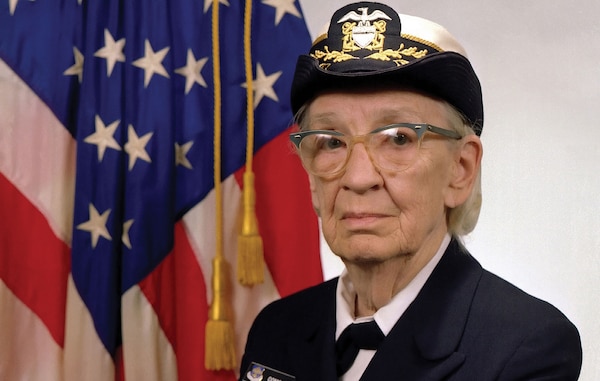 Commodore Grace M. Hopper, USN (covered), popularized idea of machine-independent programming languages that led to
development of COBOL, January 20, 1984 (U.S. Navy/James S. Davis)