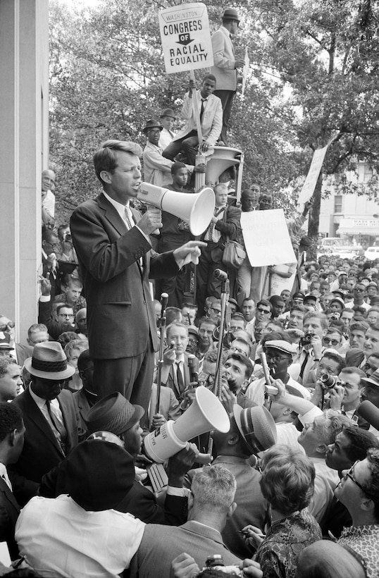 Attorney General Robert F. Kennedy speaks to crowd about racial equality, outside Justice Department, June 14, 1963