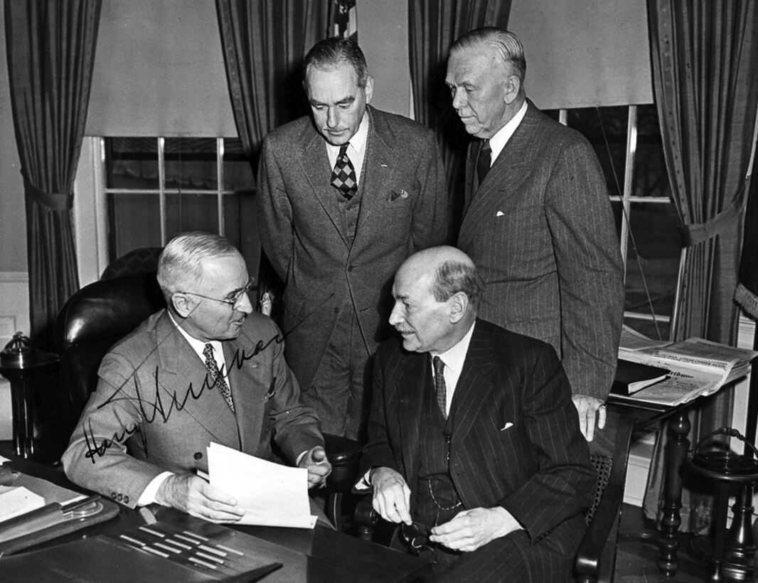 President Harry S. Truman, Secretary of State Dean Acheson, Secretary of Defense George C. Marshall, and Prime Minister Clement Attlee, at the White House, Washington, DC, December 6, 1950