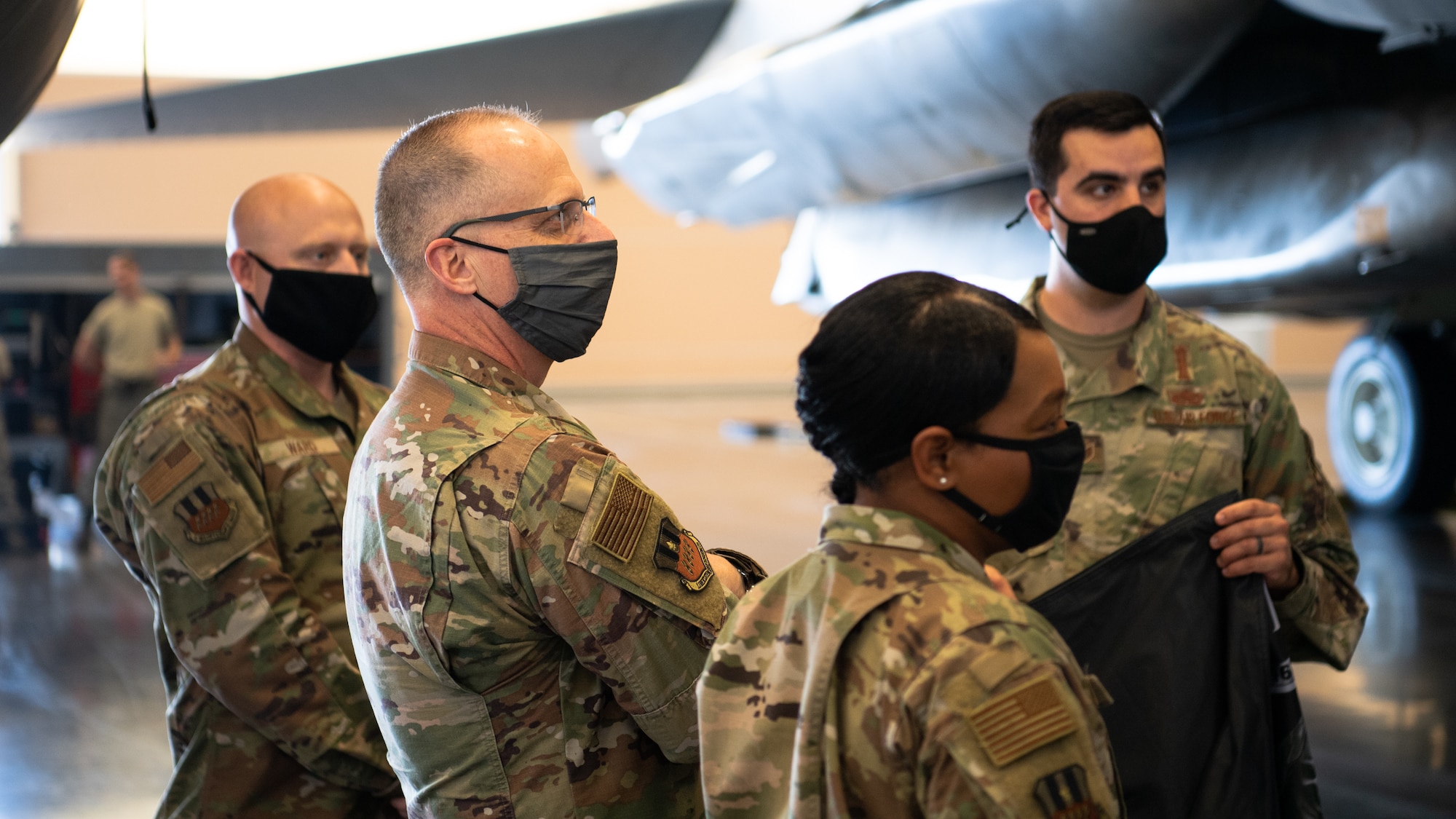 Maj. Gen. Mark E. Weatherington, 8th Air Force and Joint-Global Strike Operations Command commander, and Chief Master Sgt. Melvina A. Smith, 8th AF and J-GSOC command chief, visits the TSgt. Joshua L. Kidd Weapons Load Training Facility during their official visit to the 2nd Bomb Wing at Barksdale Air Force Base, La., Nov. 12, 2020. The visit allowed Airmen of the 2nd BW to connect with 8th AF leadership. (U.S. Air Force photo by Airman 1st Class Jacob B. Wrightsman)