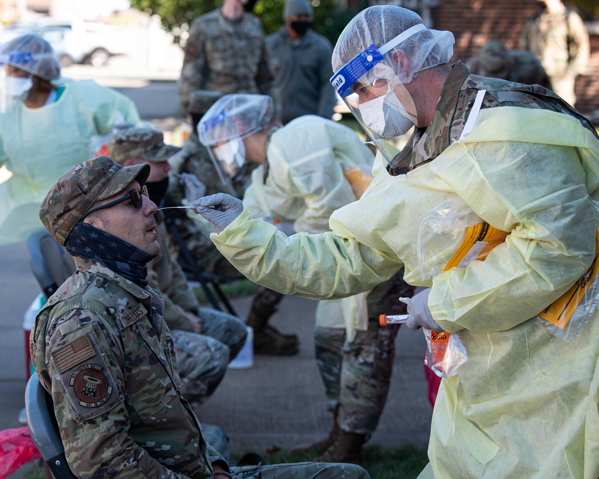A member of the 1st Fighter Wing receives a COVID test before out processing.