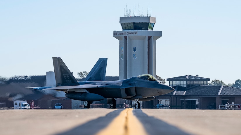 A U.S. Air Force F-22 Raptor aircraft assigned to the 1st Fighter Wing taxis prior to take off.